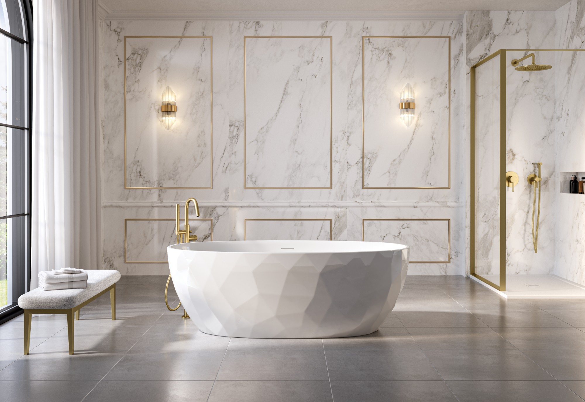 Fleurco faceted oval freestanding tub in a marble and brass bathroom