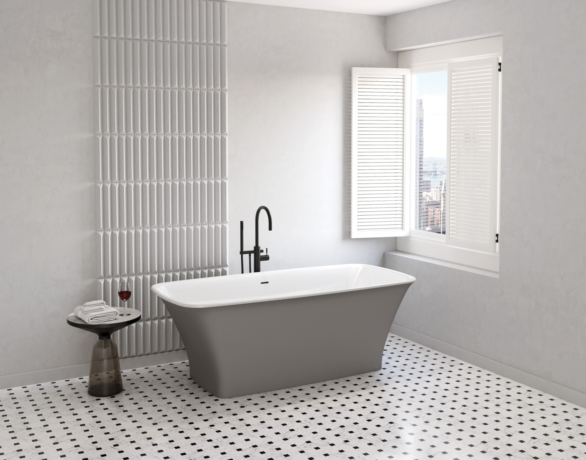 Fleurco gray rectangular freestanding tub on a mosaic tile floor