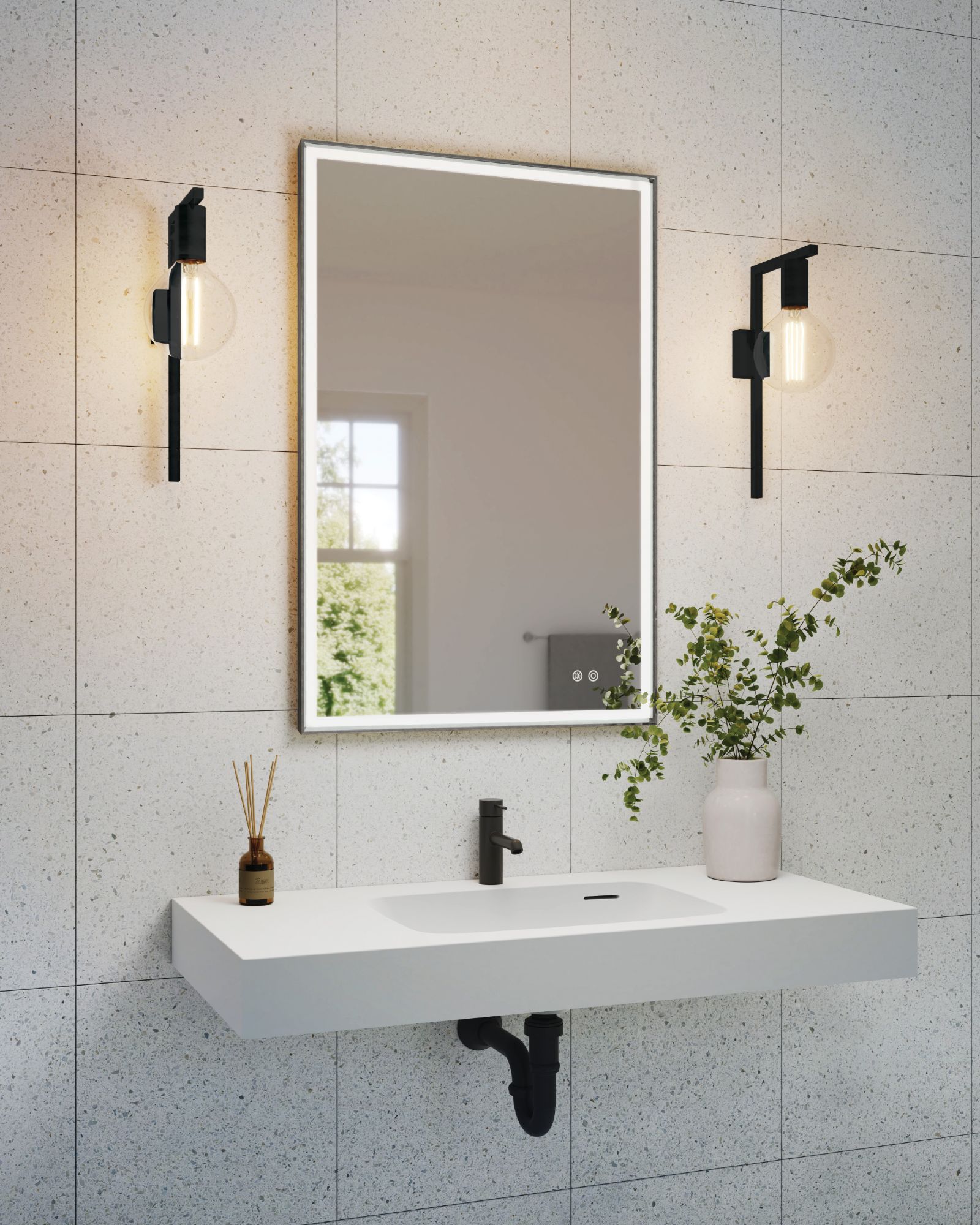 Fleurco black-framed lighted mirror above a floating sink